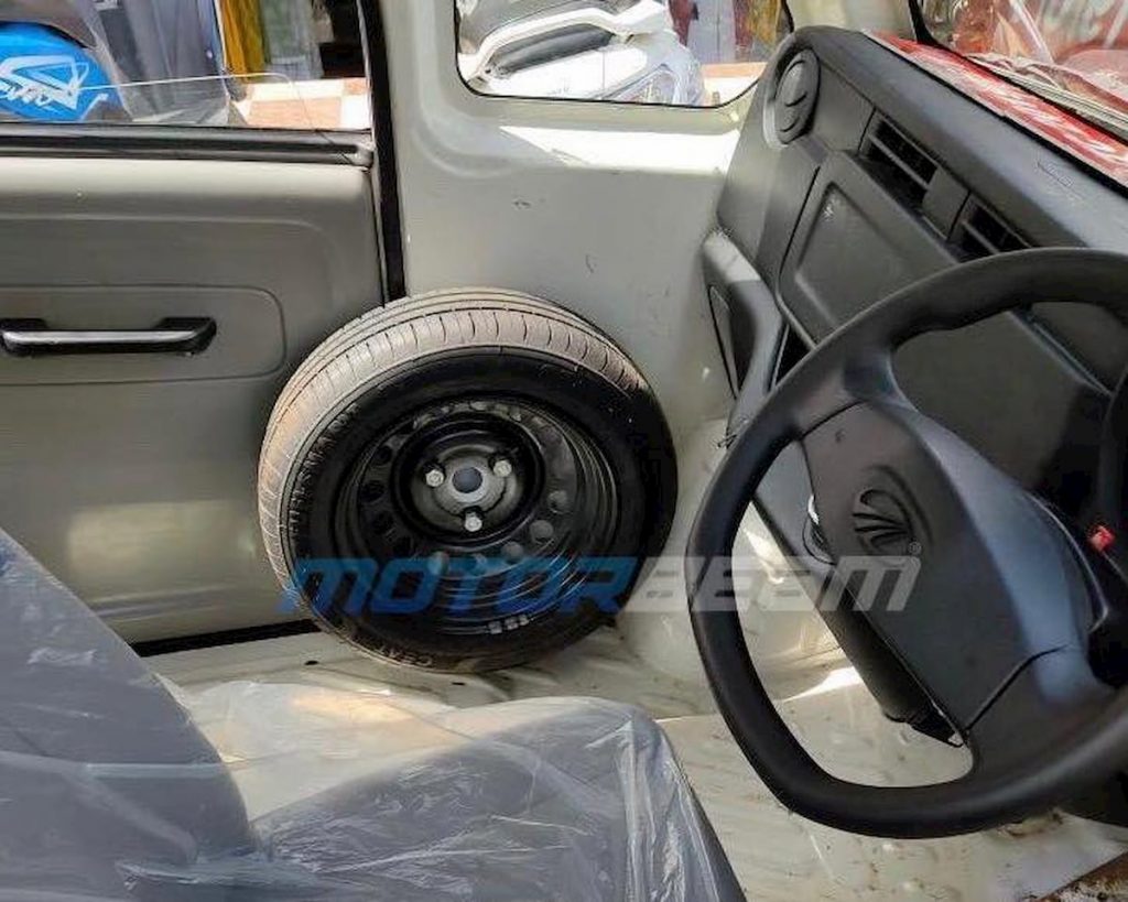 Production Mahindra Atom interior spare wheel